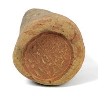 Egyptian clay funerary cone.  The base has hieroglyphs 'Revered before Osiris, the chief priest Denreg, justified'.  The cone would have been set in a wall above the tomb entrance.  18th/19th Dynasty.