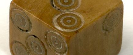 detail of an old dice